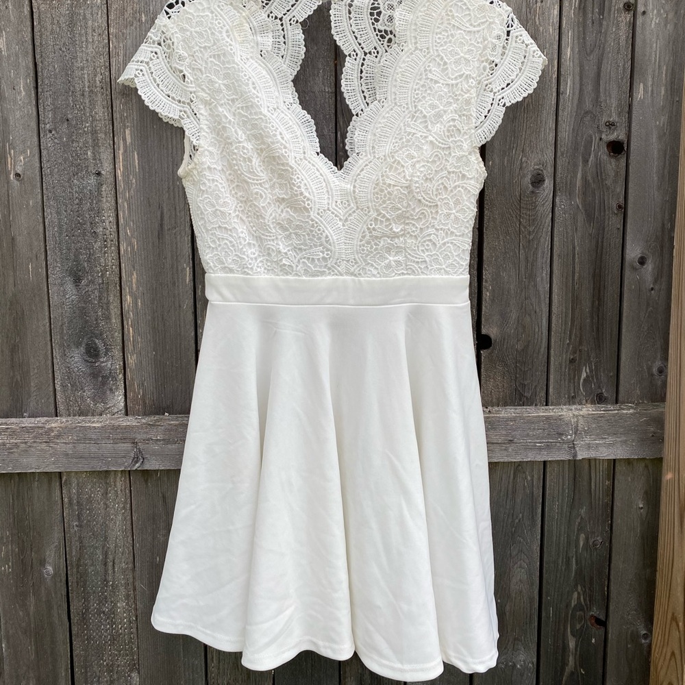 White lacy dress with open back